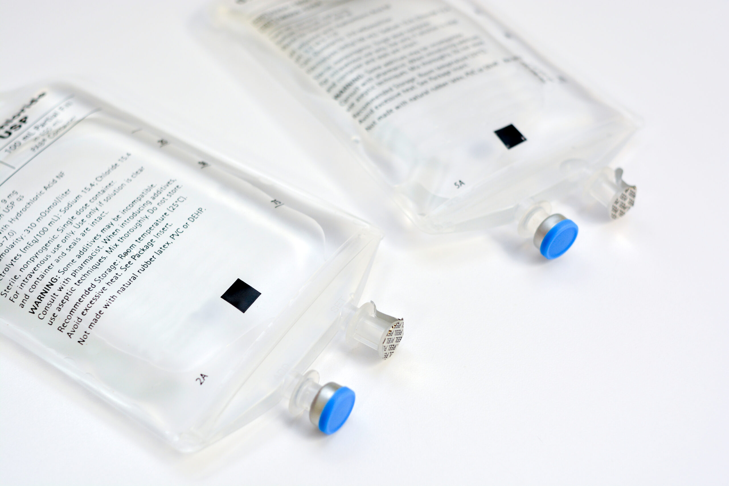 Two,Saline,Iv,Bags,On,White,Background